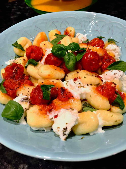 Gnocchi With Buffalo Mozzarella And Whole Cherry Tomatoes Sauce