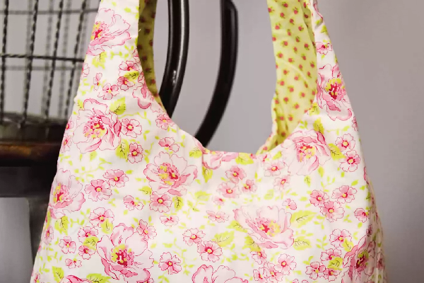 Image shows the floral bag hanging.