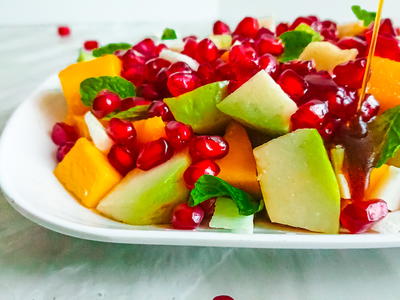 Pomegranate Salad With Mango, Coconut And Palm Sugar Dressing