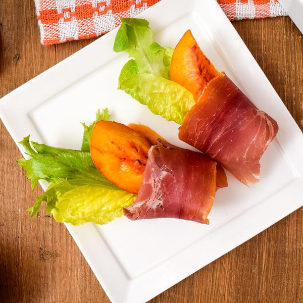 Grilled Peaches Wrapped In Prosciutto
