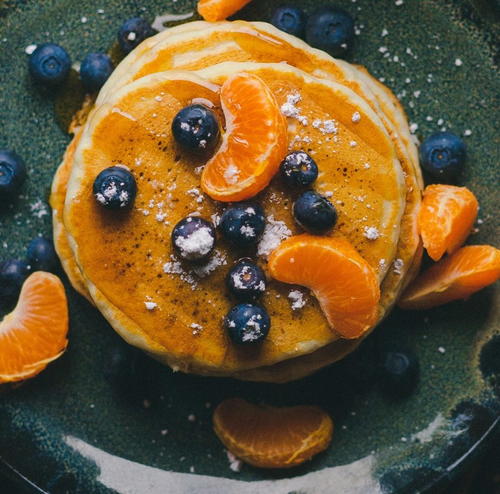 Zesty Orange Buttermilk Pancakes | AllFreeCopycatRecipes.com