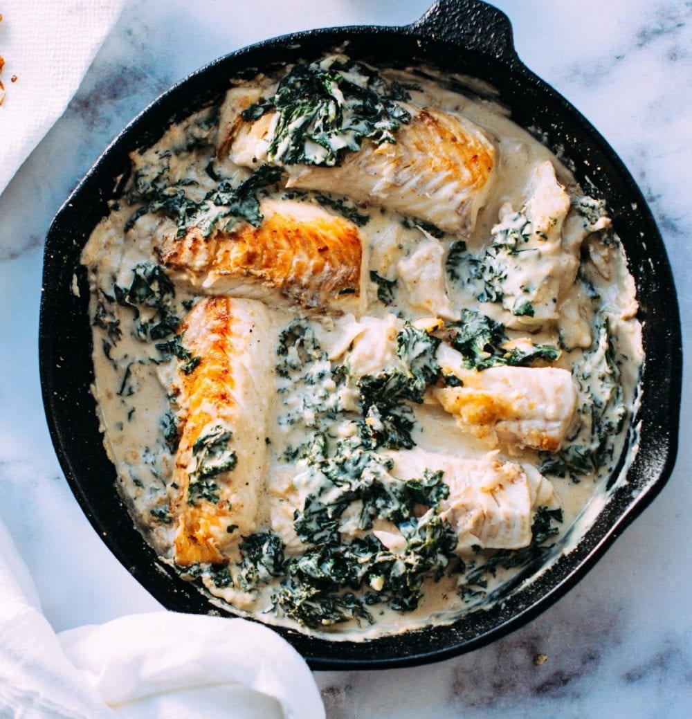 Herbaceous Baked Cod With Spinach & White Sauce | AllFreeCopycatRecipes.com