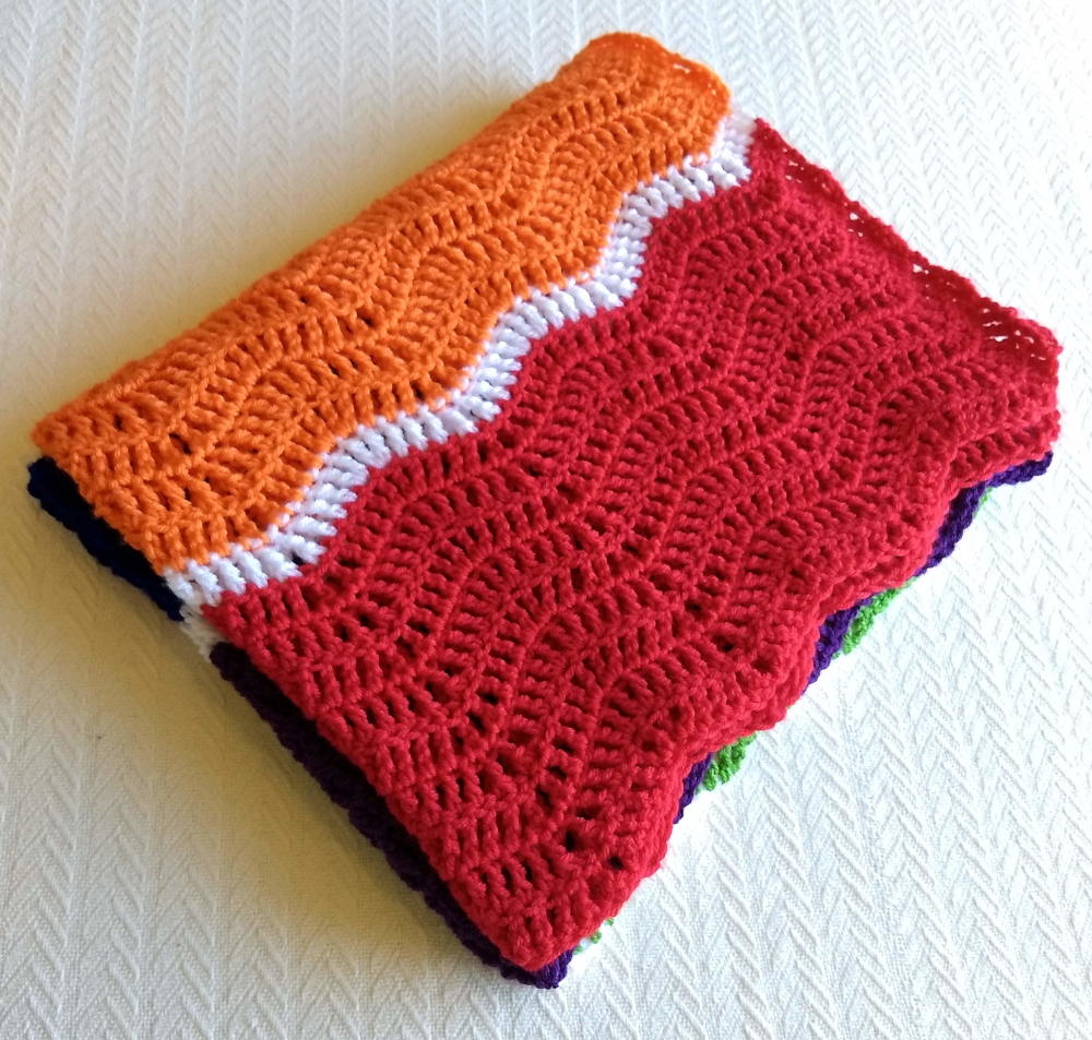 Rainbow Ripple Blanket | FaveCrafts.com
