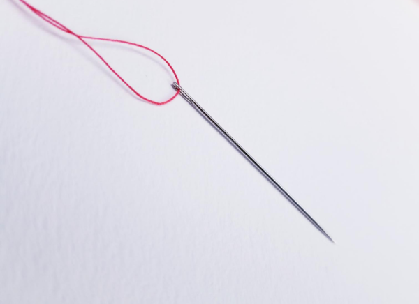 How to Use a Needle Threader (Full Tutorial) | AllFreeSewing.com