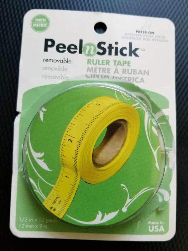 Image shows a package of iCraft PeelnStick Removable Ruler Tape.