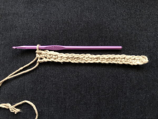 Image shows step 1 for crocheting the Solomon's Knot stitch.