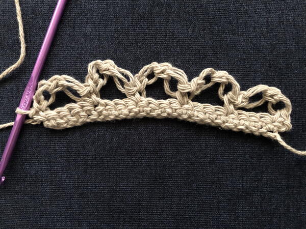 Image shows step 7 for crocheting the Solomon's Knot stitch.