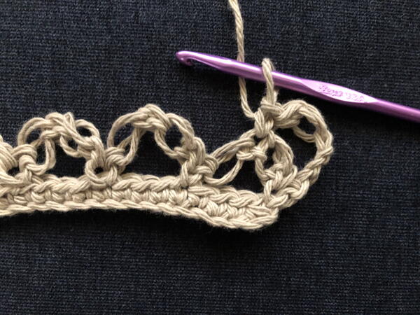 Image shows step 2 for a new row for crocheting the Solomon's Knot stitch.