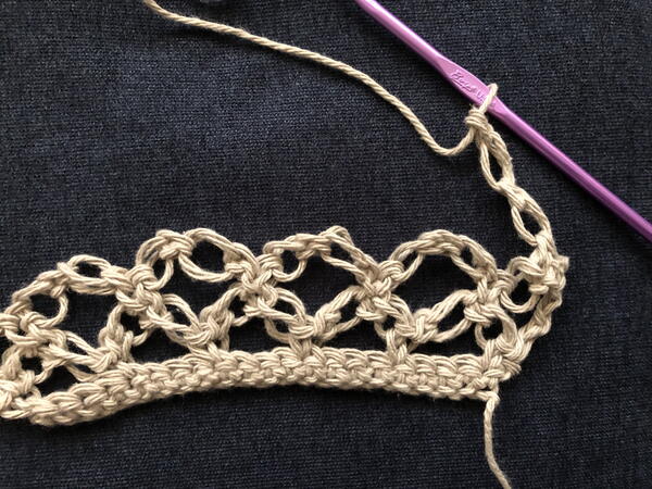 Image shows step 1 for a third row for crocheting the Solomon's Knot stitch.