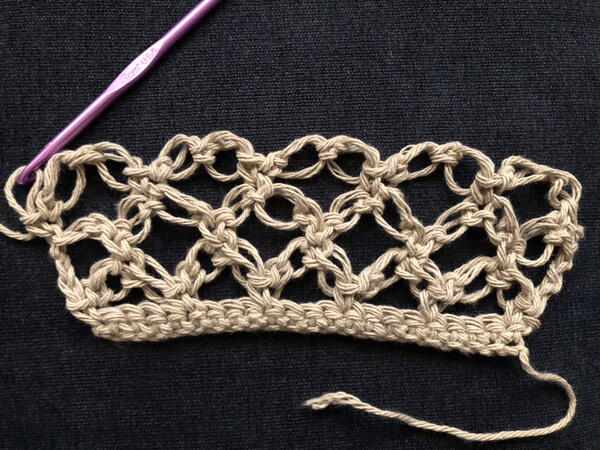 Image shows step 3 for a third row for crocheting the Solomon's Knot stitch.