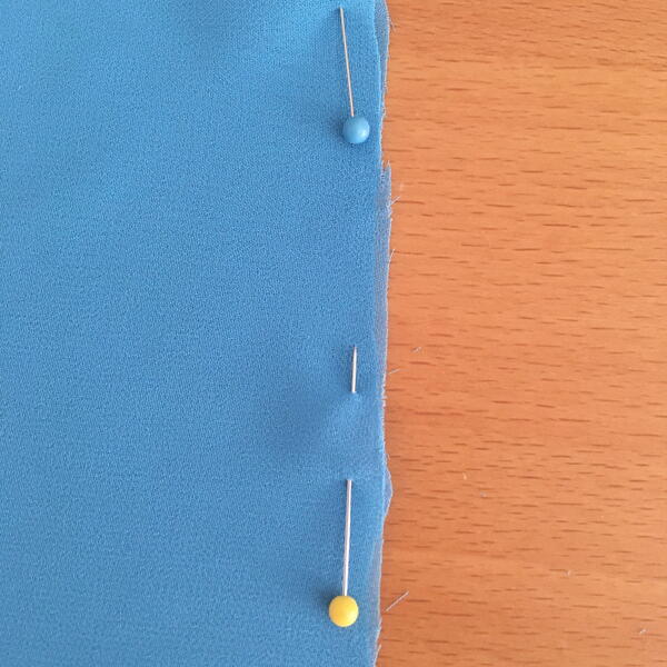 Image shows Step 1 for how to sew French seams.