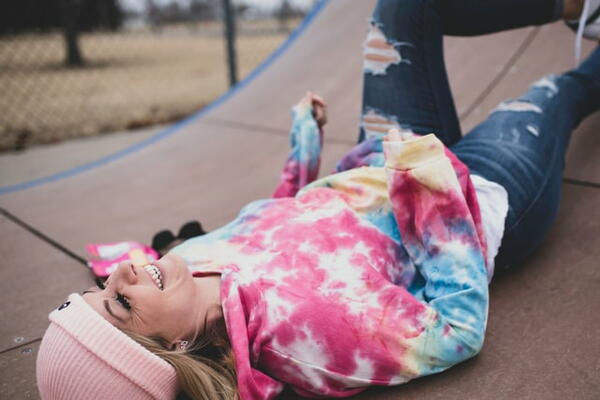 Woman in tie dye shirt