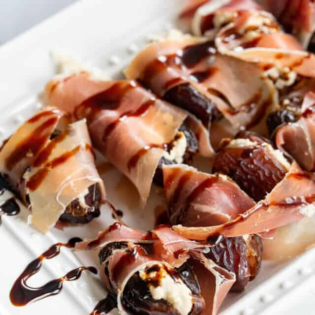 Prosciutto Wrapped Cashew Cream Cheese Stuffed Dates With Balsamic Glaze