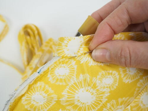 How To Make Perfect Bound Lining In A Bag | AllFreeSewing.com