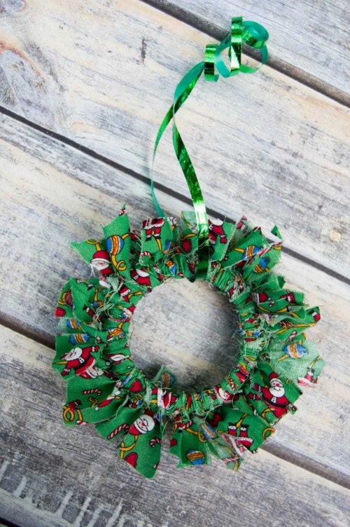 Mason Jar Lid Christmas Wreath Ornament Craft  AllFreeHolidayCrafts.com