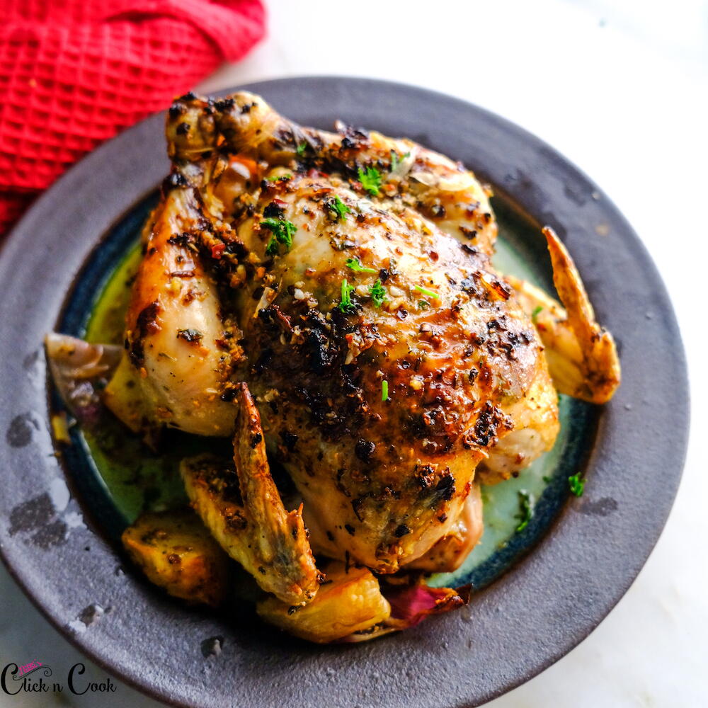 Garlic Herb Butter Roasted Chicken Recipe | FaveHealthyRecipes.com