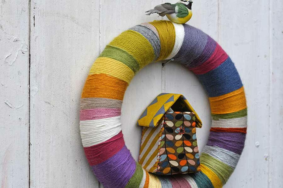 Yarn Spring Projects Colorful Scrap Yarn Spring Wreath | FaveCrafts.com