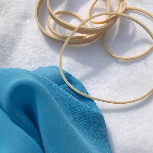 A variety of rubber bands and polyester fabrics