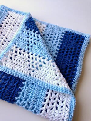 Triangles and Stripes Crochet Baby Blanket | AllFreeCrochet.com