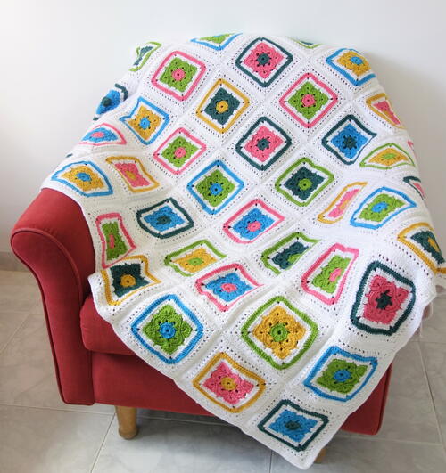 Flower Granny Square Blanket | AllFreeCrochet.com