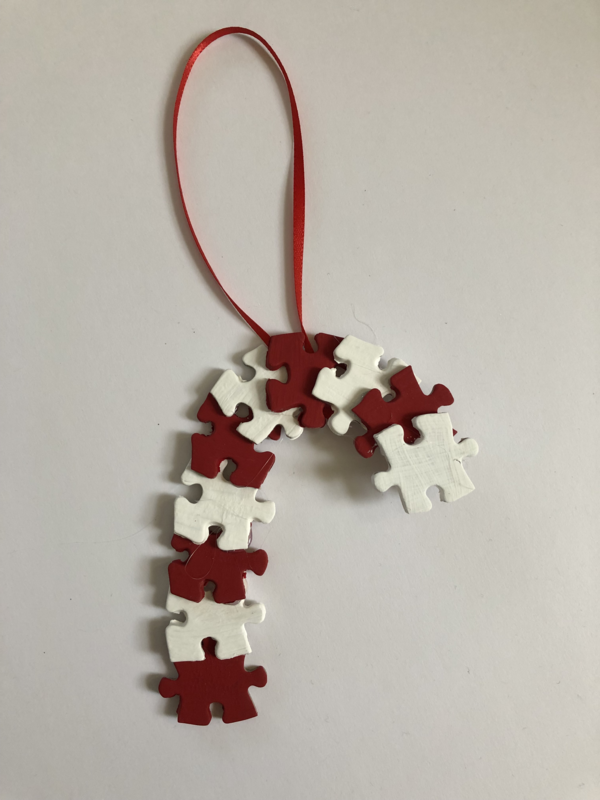 Puzzle piece candy cane ornament