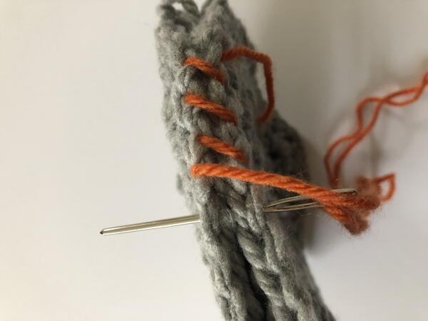Whip stitch crochet joining technique step 2