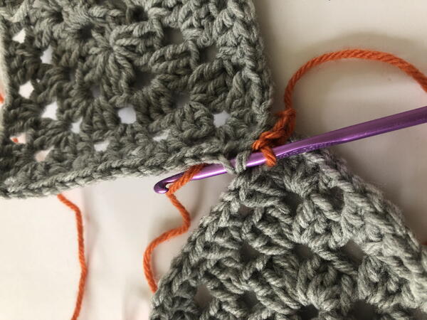 Slip stitch crochet joining technique step 1
