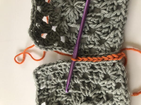 Slip stitch crochet joining technique step 2