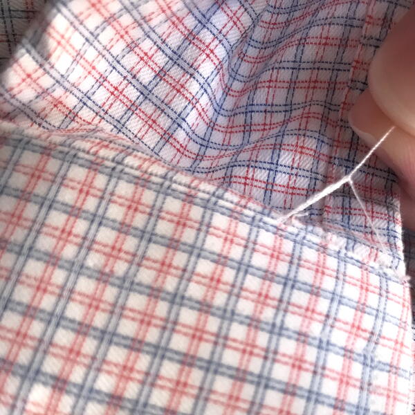 How to Fix Loose Threads on Clothes | AllFreeSewing.com