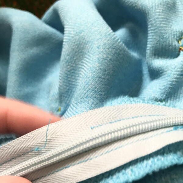 Clothing Repair for Fixing Zippers: Torn stitches on zipper