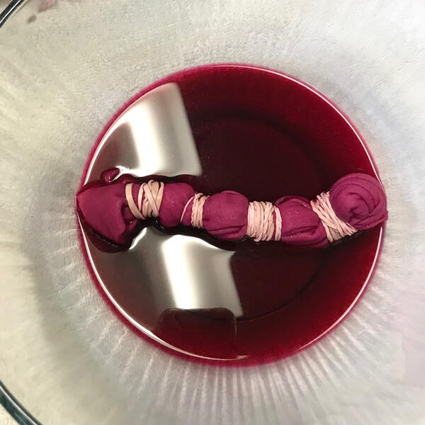 The fabric in the canned red beet dye gets darker over time.