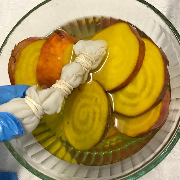 Check the progress of the fresh yellow beet dye.