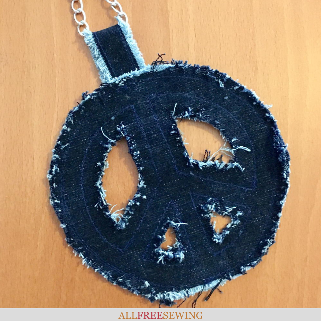 Peace sign best sale necklace
