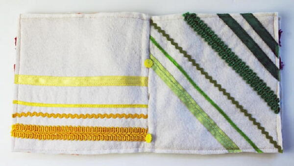 Baby's First Colorful Quiet Book Sewing Tutorial - two pages sewn of yellow and green.