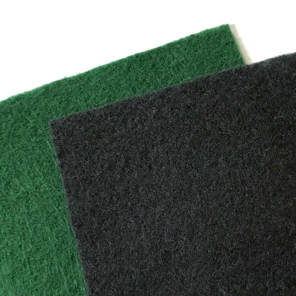 Flat felt sheets in green and black.