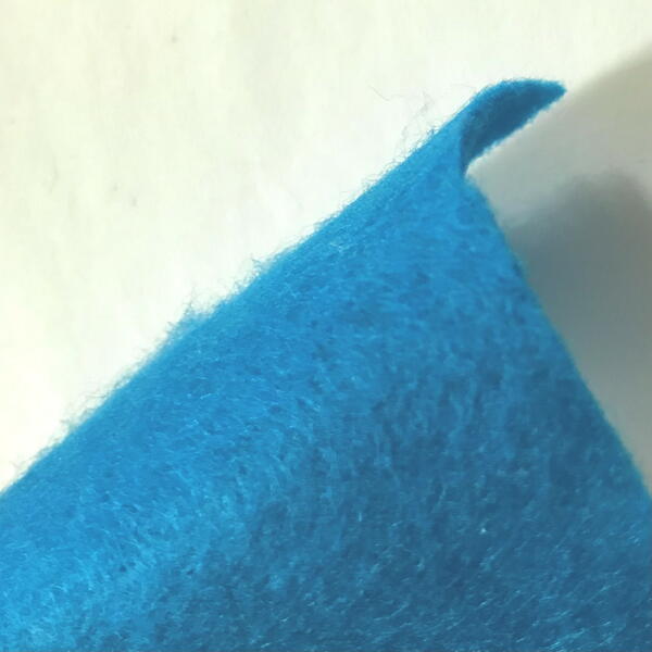 Blue felt with fuzzy texture.
