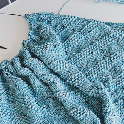 Diagonal Seed Stitch Baby Blanket