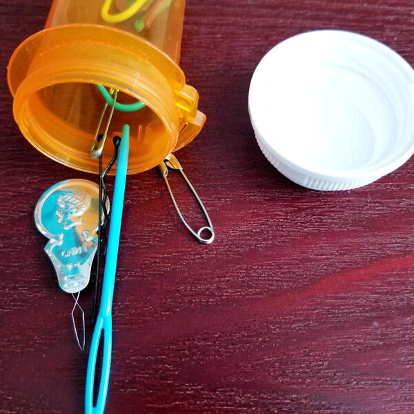 Pill bottle notions holder