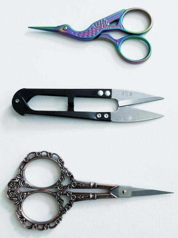 Image shows a selection of fabric scissors.