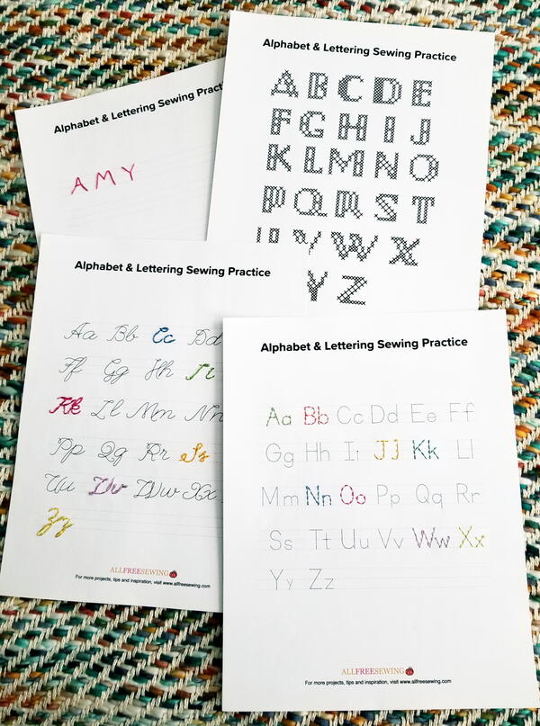 Image shows the alphabet and lettering hand sewing practice sheets.