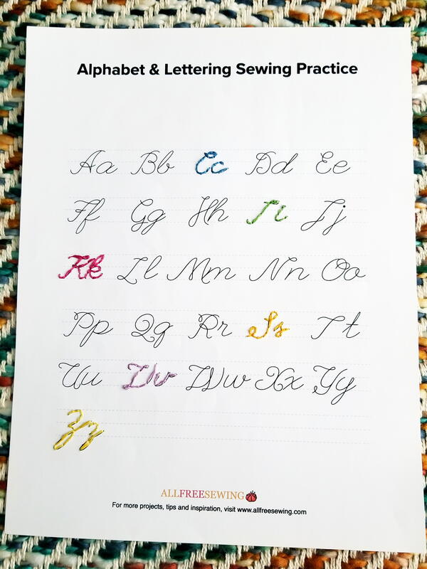 Image shows the cursive alphabet and lettering hand sewing practice sheet.