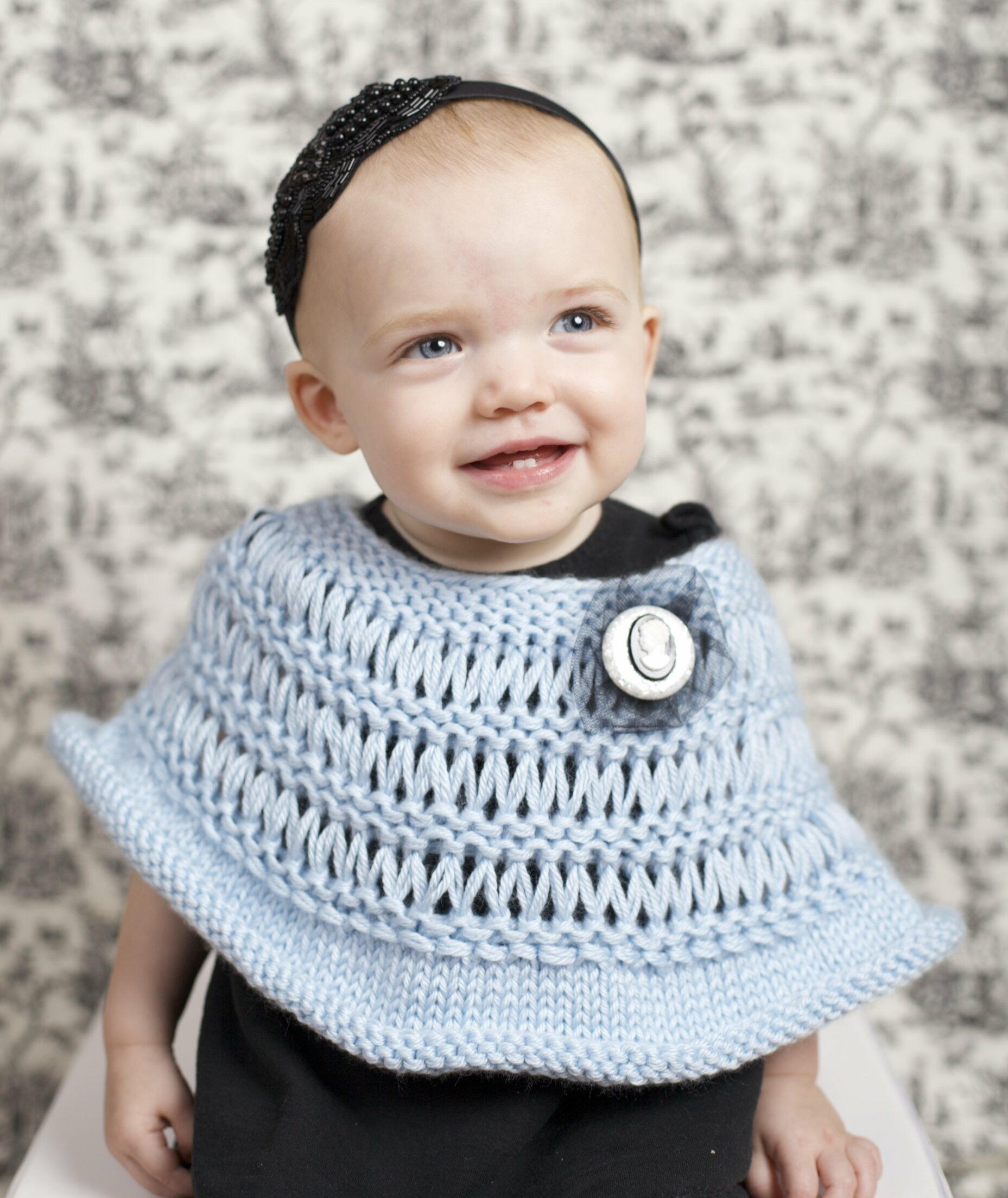 Ice Queen Baby Poncho | AllFreeKnitting.com