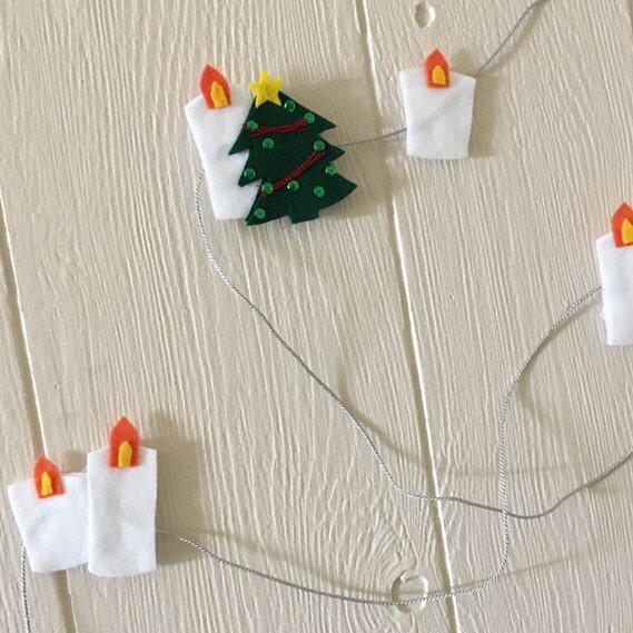 Image shows the finished Scandinavian Christmas Garland.
