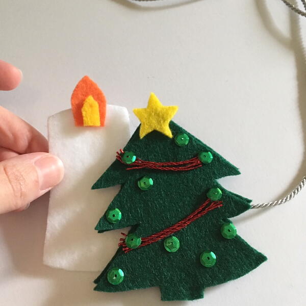 Image shows step 11 for making the Scandinavian Christmas Garland.