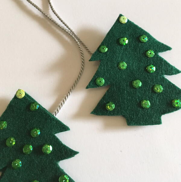 Image shows step 11 for making the Scandinavian Christmas Garland.