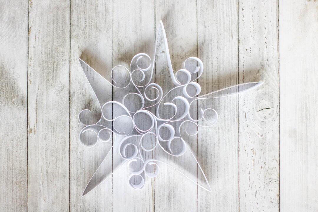 Curled Paper Snowflakes | FaveCrafts.com