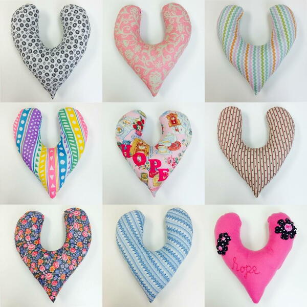 Image shows a collage of finished mastectomy heart pillow designs in various fabrics.