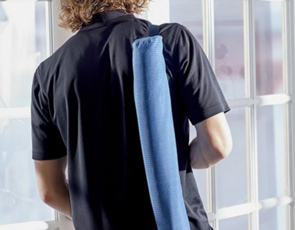 Image shows a person carrying the finished insulated beer sling.