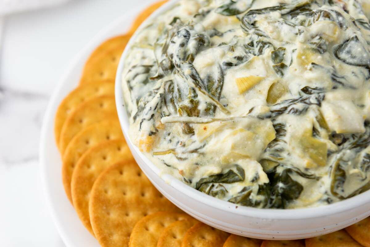 Slow Cooker Spinach Artichoke Dip | FaveSouthernRecipes.com