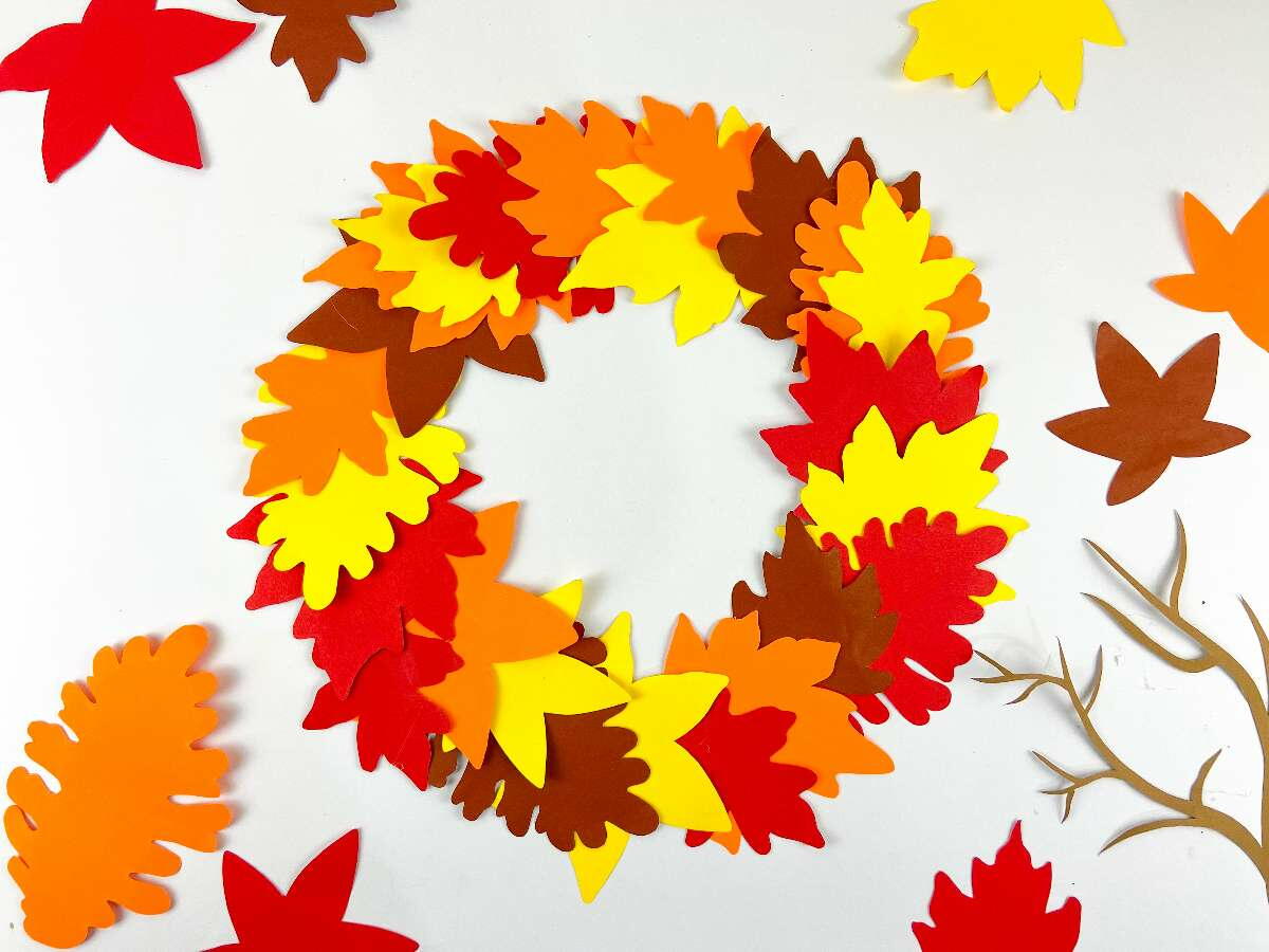 Fun And Festive Paper Leaf Fall Wreath | AllFreeHolidayCrafts.com